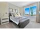 Bright bedroom with a large window and modern decor at 1542 Wax Myrtle Way, Haines City, FL 33844