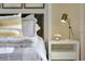 Main bedroom with nightstand and lamp at 1542 Wax Myrtle Way, Haines City, FL 33844