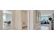 Hallway with views into office and living room at 1542 Wax Myrtle Way, Haines City, FL 33844