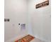 Laundry room with shelving and flooring at 1542 Wax Myrtle Way, Haines City, FL 33844