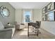 Home office with desk, two chairs, and large window at 1542 Wax Myrtle Way, Haines City, FL 33844