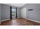 Cozy bedroom features a closet, a large window and contemporary paint at 1595 Stone Trl, Deltona, FL 32725