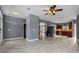 Bright, open floor plan connecting the living room and kitchen, complete with marble floors at 1595 Stone Trl, Deltona, FL 32725