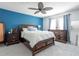 Comfortable main bedroom with a ceiling fan, and coordinating furniture at 234 Elderberry Dr, Davenport, FL 33897