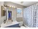 Clean bathroom with a tub shower combo and updated vanity at 2705 Grantham Ct, Orlando, FL 32835