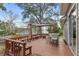 Spacious deck with pergola, seating, and bar at 2705 Grantham Ct, Orlando, FL 32835