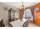 Formal dining room with a large table and hutch at 2705 Grantham Ct, Orlando, FL 32835