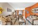 Bright living room with ornate furniture and adjacent dining area at 2705 Grantham Ct, Orlando, FL 32835