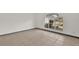 Spacious bedroom with large window and tile flooring at 2841 Derby Dr, Deltona, FL 32738