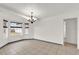 Dining area with tile floors and a chandelier at 2841 Derby Dr, Deltona, FL 32738