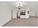 Open dining room with view into the kitchen at 2841 Derby Dr, Deltona, FL 32738