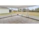 Screened porch with tile floor overlooking backyard at 2841 Derby Dr, Deltona, FL 32738