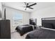 Spacious bedroom with two twin beds, perfect for guests at 297 Jetty Way, Davenport, FL 33897