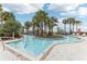 Lazy river style pool with a relaxing atmosphere at 297 Jetty Way, Davenport, FL 33897