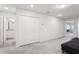 Bright hallway with a built-in closet and access to bedrooms at 297 Jetty Way, Davenport, FL 33897