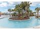 Resort-style lazy river with lush landscaping at 297 Jetty Way, Davenport, FL 33897