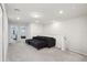 Comfortable loft area with a sectional sofa and plenty of space at 297 Jetty Way, Davenport, FL 33897