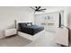 Spacious main bedroom with a king-size bed and en-suite bathroom at 297 Jetty Way, Davenport, FL 33897