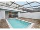 Private screened-in pool and patio area at 297 Jetty Way, Davenport, FL 33897