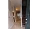 Bright and spacious entryway with tiled floors and staircase at 4145 Plantation Cove Dr, Orlando, FL 32810