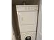 Stackable washer and dryer in laundry closet at 4145 Plantation Cove Dr, Orlando, FL 32810