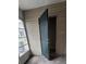 Screened porch with access to storage closet at 4145 Plantation Cove Dr, Orlando, FL 32810