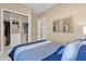 Spacious bedroom with a large closet and stylish decor at 5599 Sw 92Nd Avenue Rd, Ocala, FL 34481
