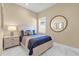 Bright bedroom featuring a comfortable bed and ample natural light at 5599 Sw 92Nd Avenue Rd, Ocala, FL 34481