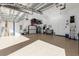 Garage with overhead storage and workbenches at 5599 Sw 92Nd Avenue Rd, Ocala, FL 34481