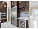 Well-equipped kitchen with wine cooler and pantry at 5599 Sw 92Nd Avenue Rd, Ocala, FL 34481