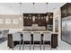 Gourmet kitchen boasts a large island, modern cabinetry, and ample counter space at 5599 Sw 92Nd Avenue Rd, Ocala, FL 34481