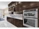 Modern kitchen features double oven and sleek cabinetry at 5599 Sw 92Nd Avenue Rd, Ocala, FL 34481
