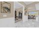 Open living area with marble floors and view to the office at 5599 Sw 92Nd Avenue Rd, Ocala, FL 34481