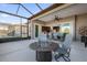 Covered patio with fire pit and dining furniture at 5599 Sw 92Nd Avenue Rd, Ocala, FL 34481