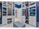Spacious walk-in closet with ample shelving and drawers at 5599 Sw 92Nd Avenue Rd, Ocala, FL 34481