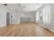 This bonus room features beautiful hardwood floors, recessed lighting, and a metal railing at 6241 Blakeford Dr, Windermere, FL 34786