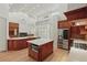 Spacious kitchen with stainless appliances, a center island, and ample counter space at 6241 Blakeford Dr, Windermere, FL 34786