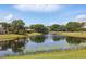 Scenic lake view showcasing the community's natural beauty and serene atmosphere at 6241 Blakeford Dr, Windermere, FL 34786