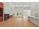 Spacious living room with a fireplace, large windows, and an open floor plan at 6241 Blakeford Dr, Windermere, FL 34786