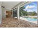 Covered outdoor kitchen overlooking the pool and backyard at 6241 Blakeford Dr, Windermere, FL 34786