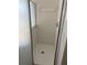 Tiled bathroom shower with glass enclosure at 63 York Ct, Kissimmee, FL 34758