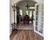 Elegant dining room with a chandelier, table, chairs, and french doors to let in natural light at 63 York Ct, Kissimmee, FL 34758
