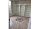 Bright office space with white built-in shelving and a decorative tile centerpiece at 63 York Ct, Kissimmee, FL 34758