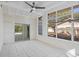 Sunroom with tile floors, sliding glass doors, and pool view at 6618 Hill Top Rd, Orlando, FL 32810