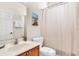 Small bathroom with shower/tub combo and updated vanity at 7403 Velleux St, Reunion, FL 34747