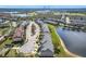 Aerial view of townhouses community near lake at 812 Park Grove Ct, Orlando, FL 32828