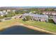 Aerial view of townhome near lake and community at 812 Park Grove Ct, Orlando, FL 32828