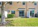 Private backyard with patio and grill at 812 Park Grove Ct, Orlando, FL 32828