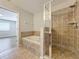 Bathroom with a soaking tub and walk-in shower at 812 Park Grove Ct, Orlando, FL 32828