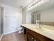 Bathroom boasts double vanity, shower, and tub at 812 Park Grove Ct, Orlando, FL 32828